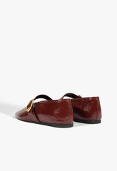 Courtney Buckle Patent Flat