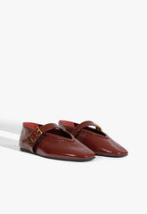 Courtney Buckle Patent Flat